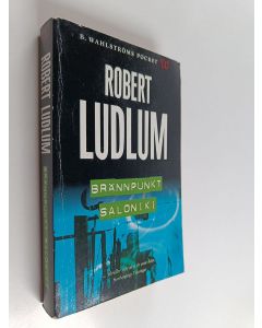 Kirjailijan Robert Ludlum käytetty kirja Brännpunkt saloniki