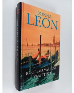 Kirjailijan Donna Leon käytetty kirja Kuolema väärissä vaatteissa