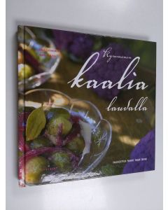 Kirjailijan Maija Silvennoinen & Saara Vesikansa käytetty kirja Kymmenen kaalia laudalla