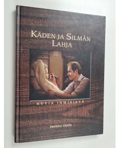 Kirjailijan Jaakko Ojala käytetty kirja Käden ja silmän lahja : kuvia ihmisistä