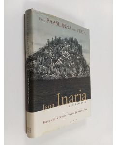 Kirjailijan Erno Paasilinna käytetty kirja Isoa Inaria kiertämässä : kuvauksia Inarin vesiltä ja rannoilta