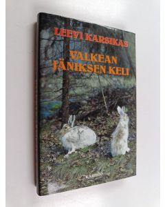Kirjailijan Leevi Karsikas käytetty kirja Valkean jäniksen keli : Eräkertomuksia