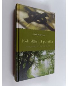 Kirjailijan Liisa Seppänen käytetty kirja Kelttiläisillä poluilla : kohtaamisia pyhimysten kanssa