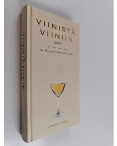 Kirjailijan Juha Berglund käytetty kirja Viinistä viiniin 2009 : viininystävän vuosikirja