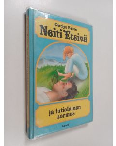 Kirjailijan Carolyn Keene käytetty kirja Neiti Etsivä ja intialainen sormus