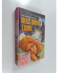 Kirjailijan Carolyn Keene käytetty kirja The Mystery of the Brass Bound Trunk