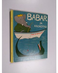 Kirjailijan Jean de Brunhoff käytetty kirja Babar ja krokotiili