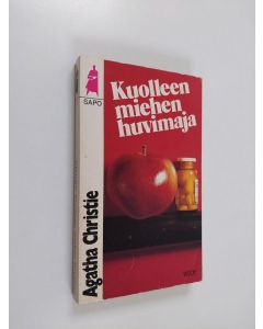 Kirjailijan Agatha Christie käytetty kirja Kuolleen miehen huvimaja