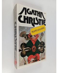 Kirjailijan Agatha Christie käytetty kirja Kortit pöydällä ; Syyttävä sormi