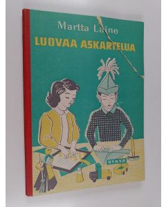 Kirjailijan Martta Laine käytetty kirja Luovaa askartelua