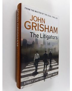 Kirjailijan John Grisham käytetty kirja The litigators