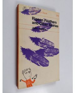 Kirjailijan John Updike käytetty kirja Pigeon feathers and other stories
