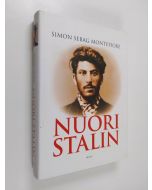 Kirjailijan Simon Sebag Montefiore käytetty kirja Nuori Stalin