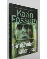 Kirjailijan Karin Fossum käytetty kirja När djävulen håller ljuset