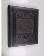 Kirjailijan Bryan Cogman käytetty kirja Game of thrones : valtaistuinpelin kulisseissa