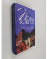 Kirjailijan Nora Roberts käytetty kirja Pitkä matka kotiin