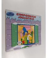 Kirjailijan Matt Groening käytetty kirja Simpsonien joulukirja