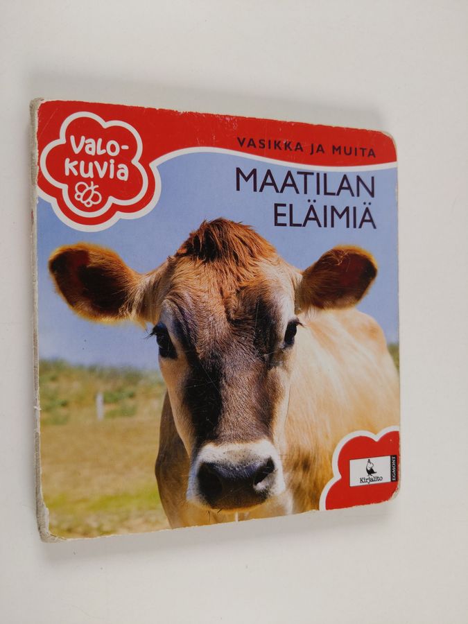 Vasikka ja muita maatilan eläimiä