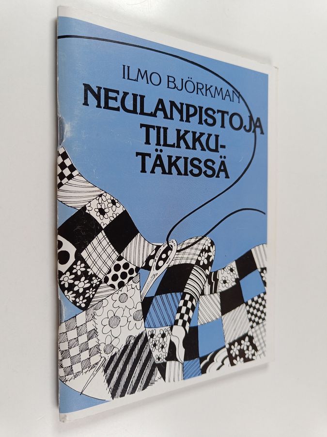 Neulanpistoja tilkkutäkissä