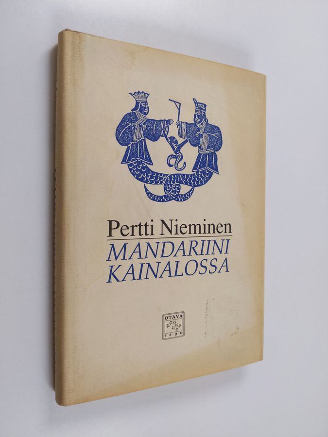 Mandariini kainalossa