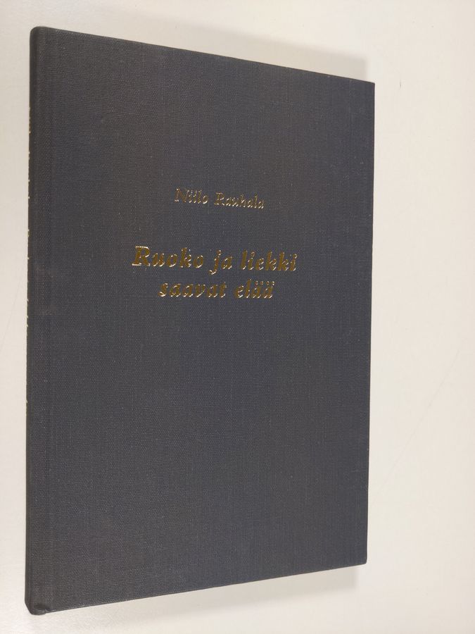 Niilo Rauhala : Ruoko ja liekki saavat elää : runoja
