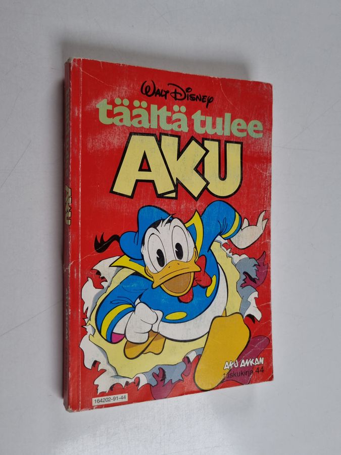 Walt Disney : Täältä tulee Aku