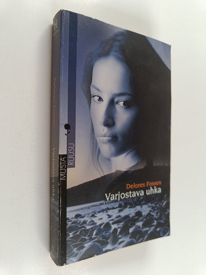 Delores Fossen : Varjostava uhka