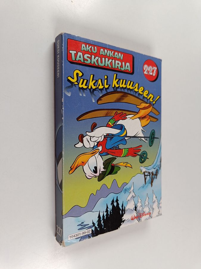 Suksi kuuseen!