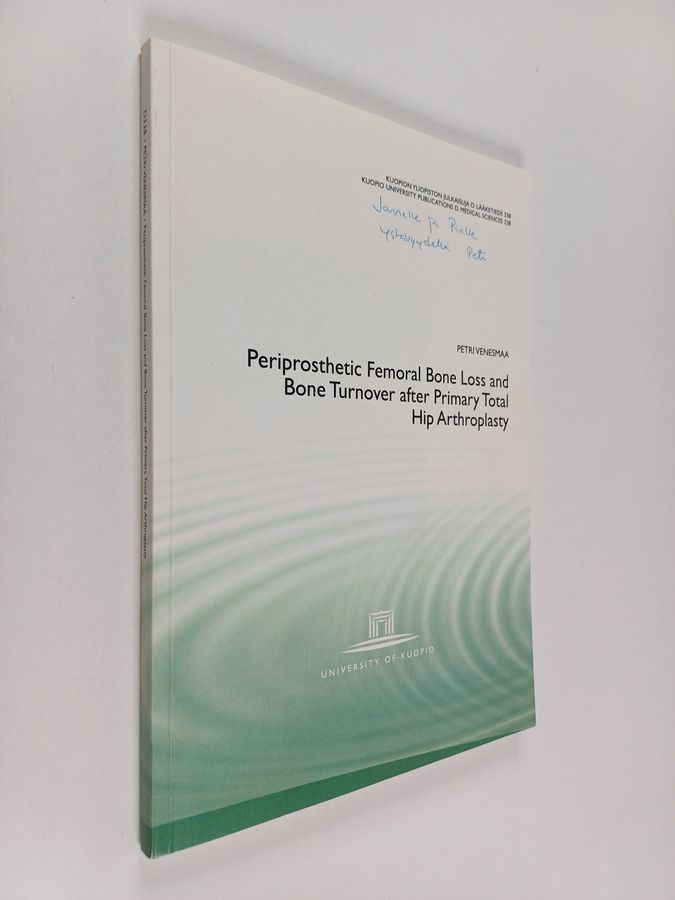 Periprosthetic femoral bone loss and bone turnover after primary total hip arthroplasty