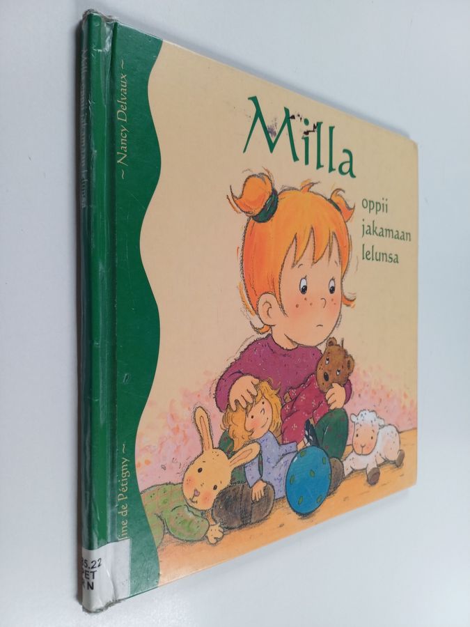 Milla oppii jakamaan lelunsa