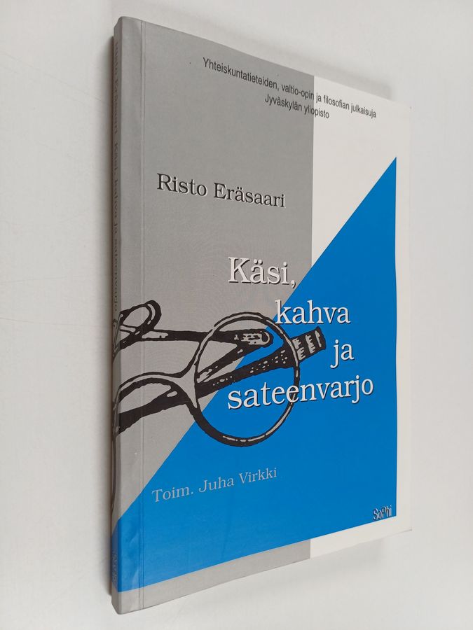 Käsi, kahva ja sateenvarjo