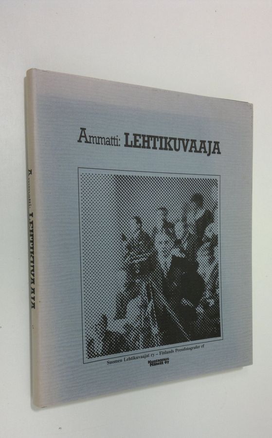 Ammatti: lehtikuvaaja