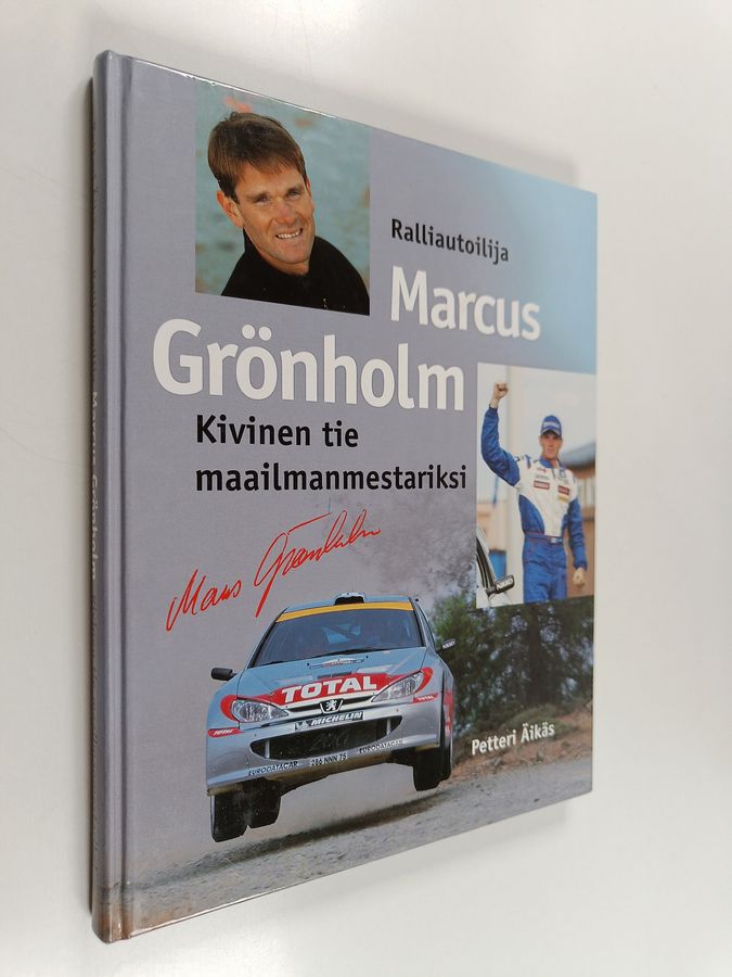 Petteri Äikäs : Ralliautoilija Marcus Grönholm - kivinen tie maailmanmestariksi (signeerattu)