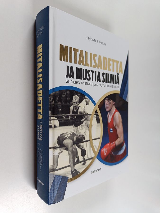 Christer Sarlin : Mitalisadetta ja mustia silmiä : Suomen nyrkkeilyn olympiahistoria