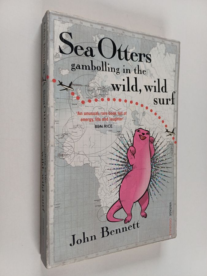 Sea otters gambolling in the wild, wild surf