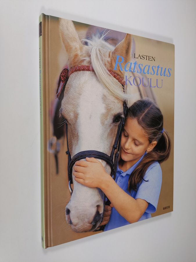 Catherine Saunders : Lasten ratsastuskoulu : opi ratsastusta oikeassa ratsastuskoulussa