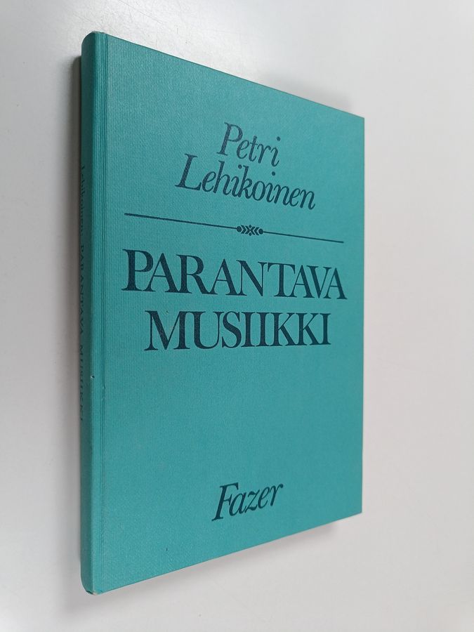 Petri Lehikoinen : Parantava musiikki : johdatus musiikkiterapian peruskysymyksiin (signeerattu, tekijän omiste)