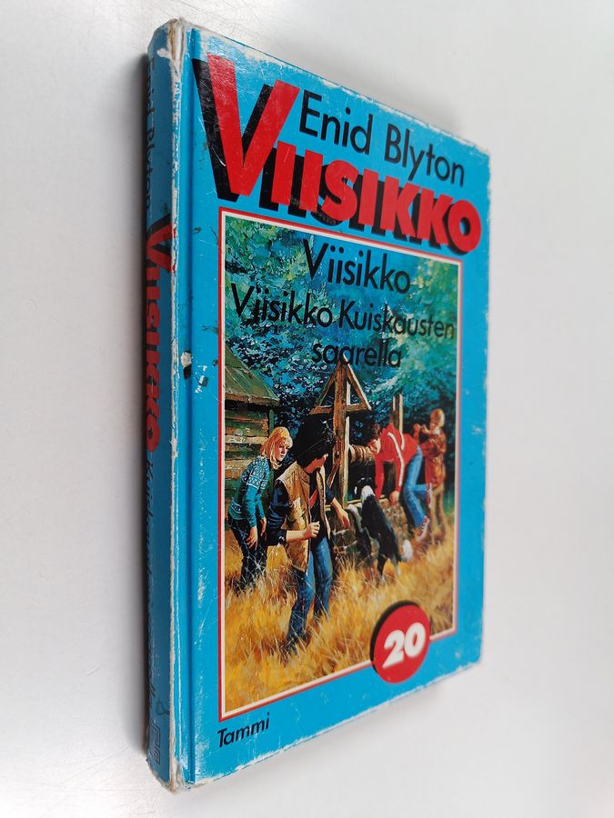 Enid Blyton : Viisikko Kuiskausten saarella